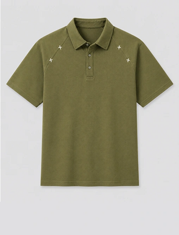 Green polo shirt with white star patterns