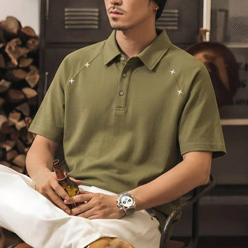 green star embroidered polo