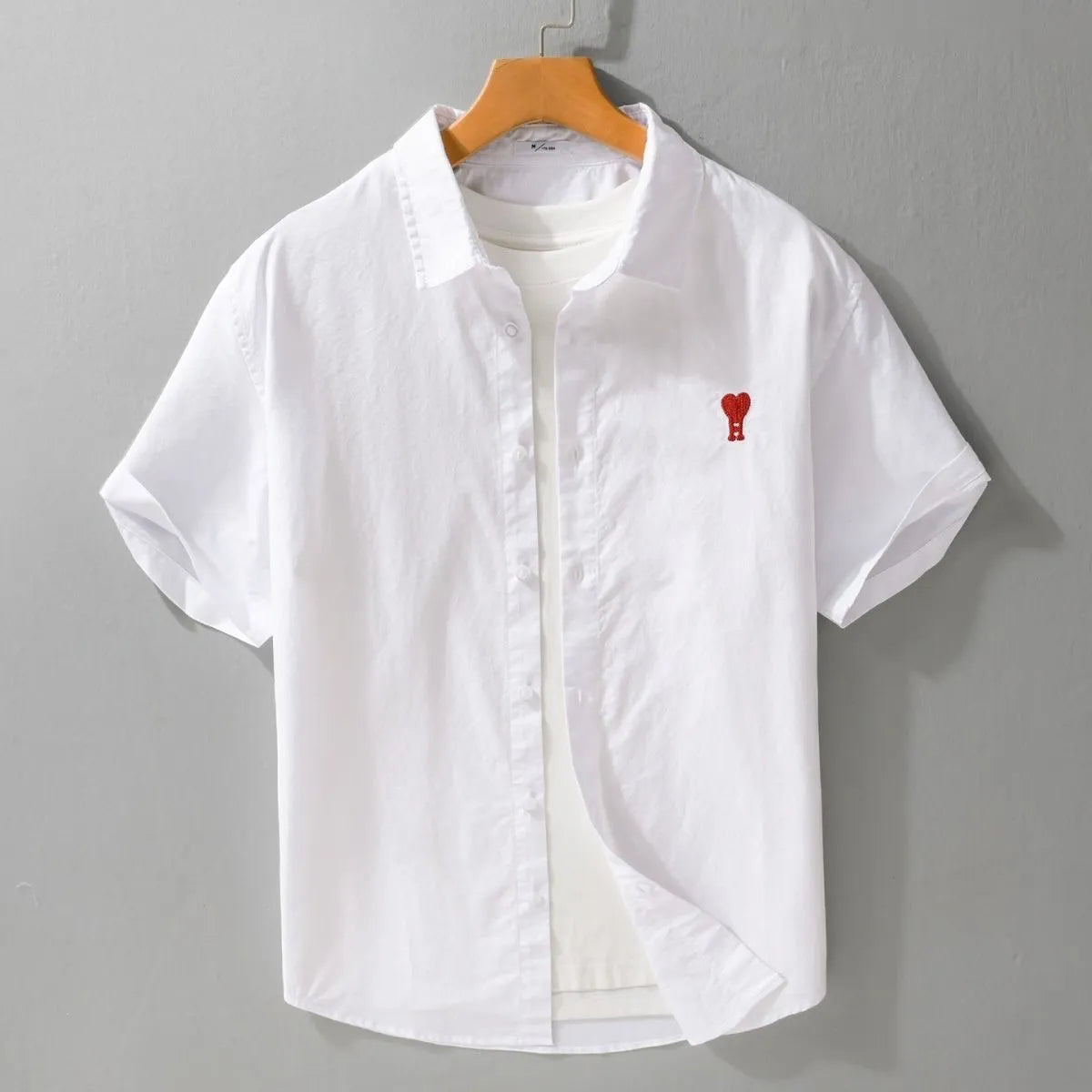 white embroidered short sleeve shirt detail